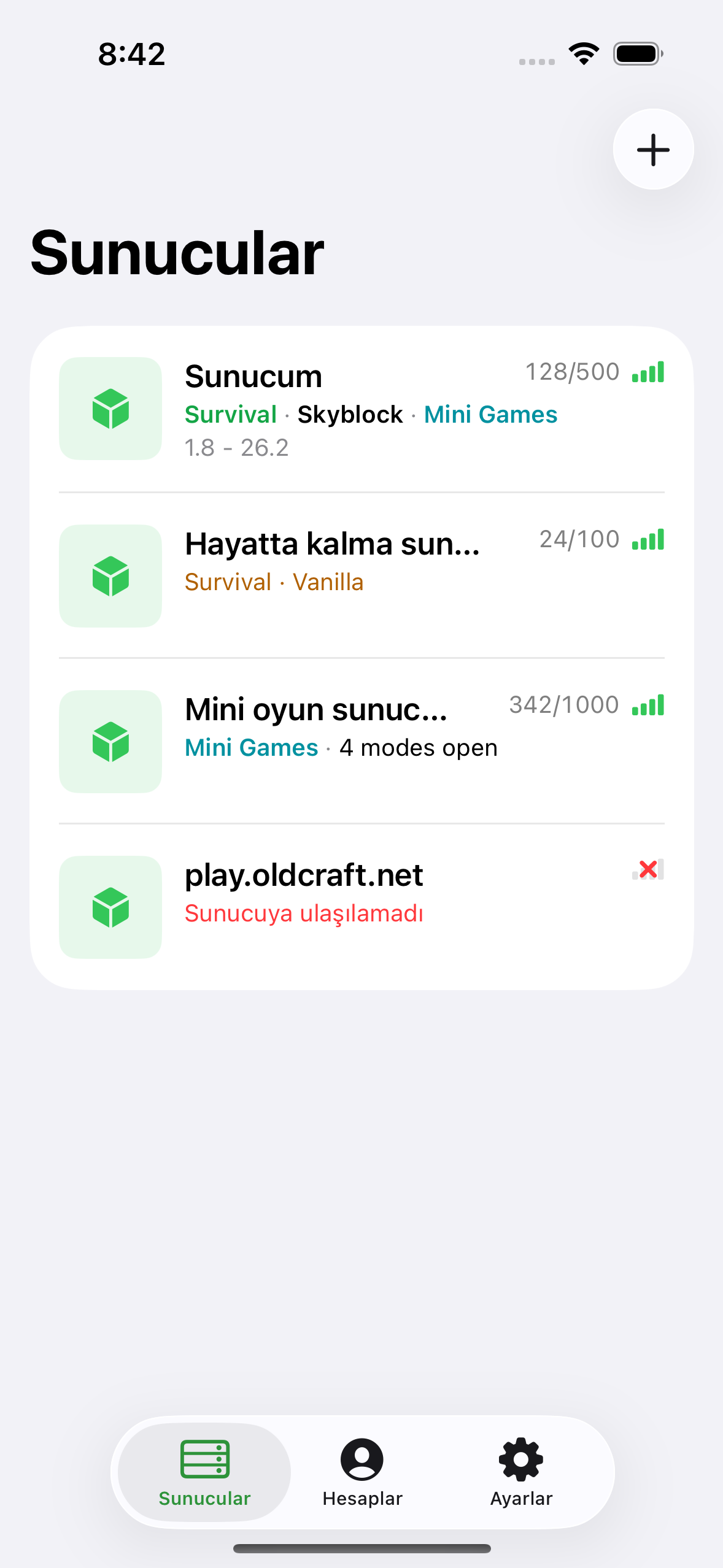 The ChatMC server list showing saved servers with player counts.